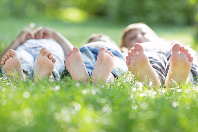 Children lying in a field